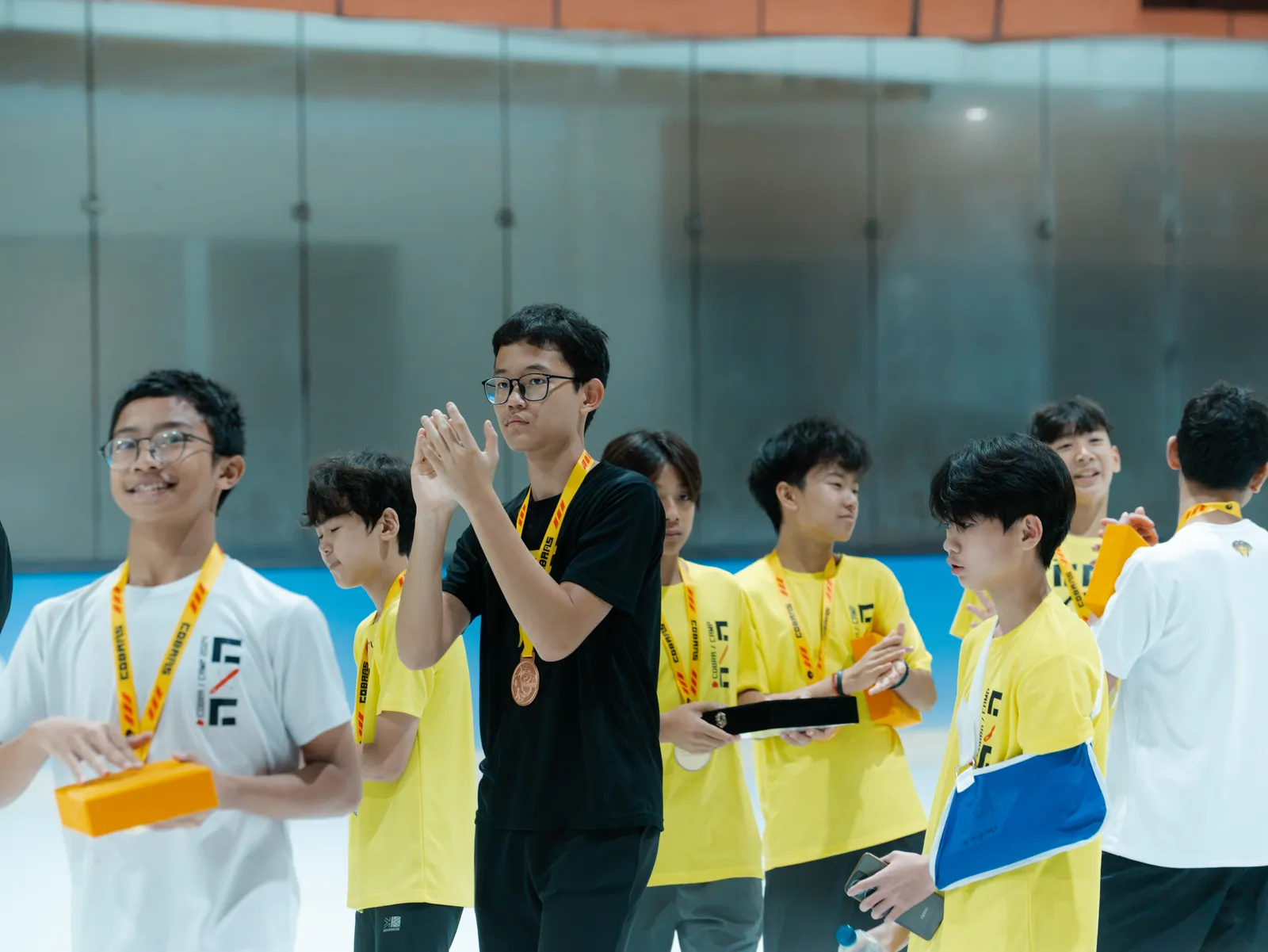 Players with their medals at COBRA/CAMP 2026