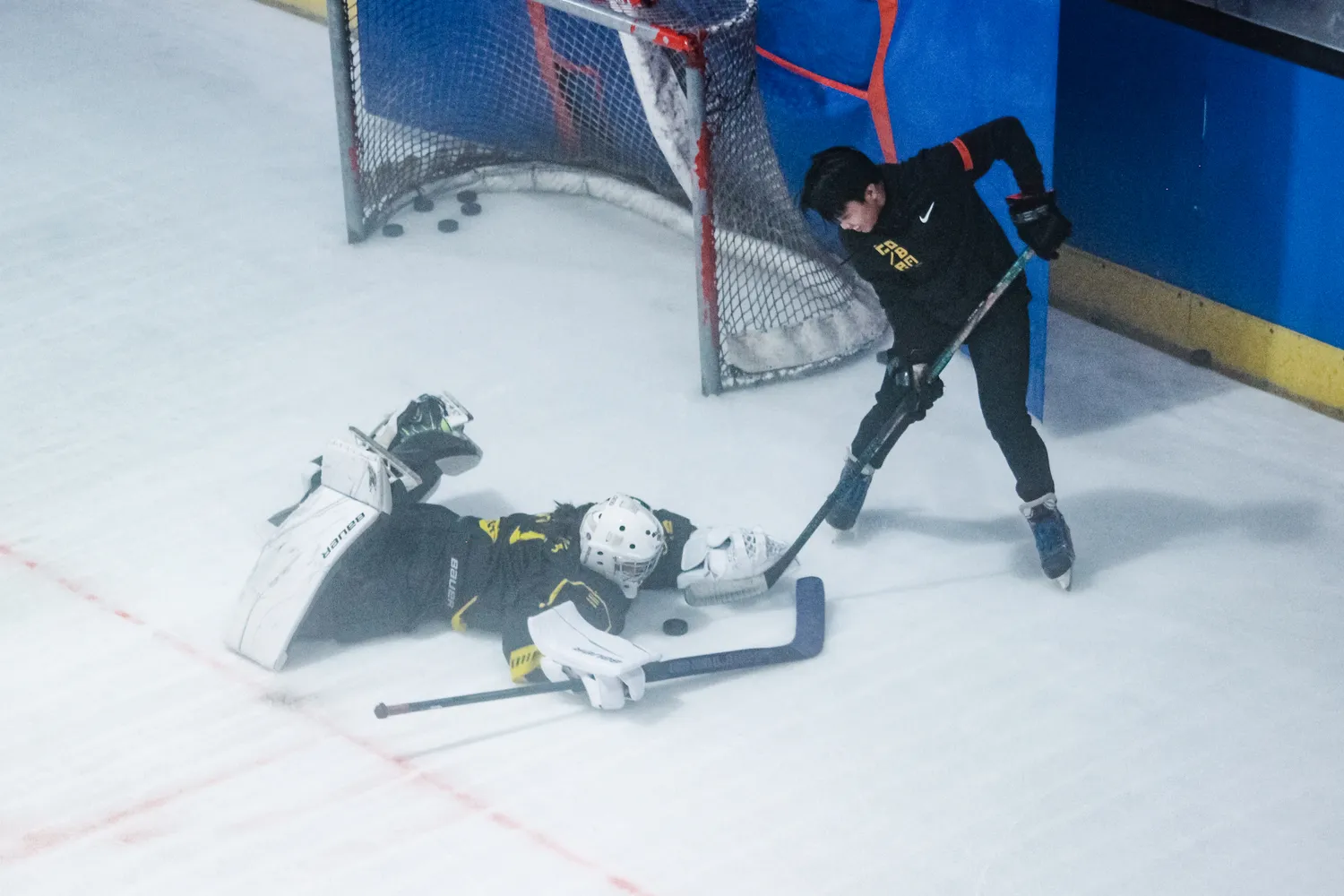 A goalkeeper drill during practice
